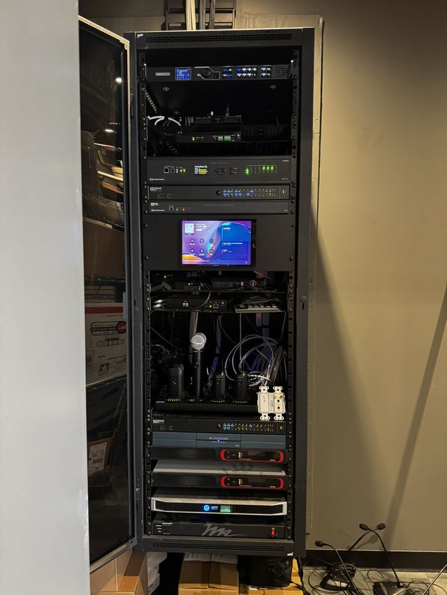 Equipment rack with the signage and AV electronics